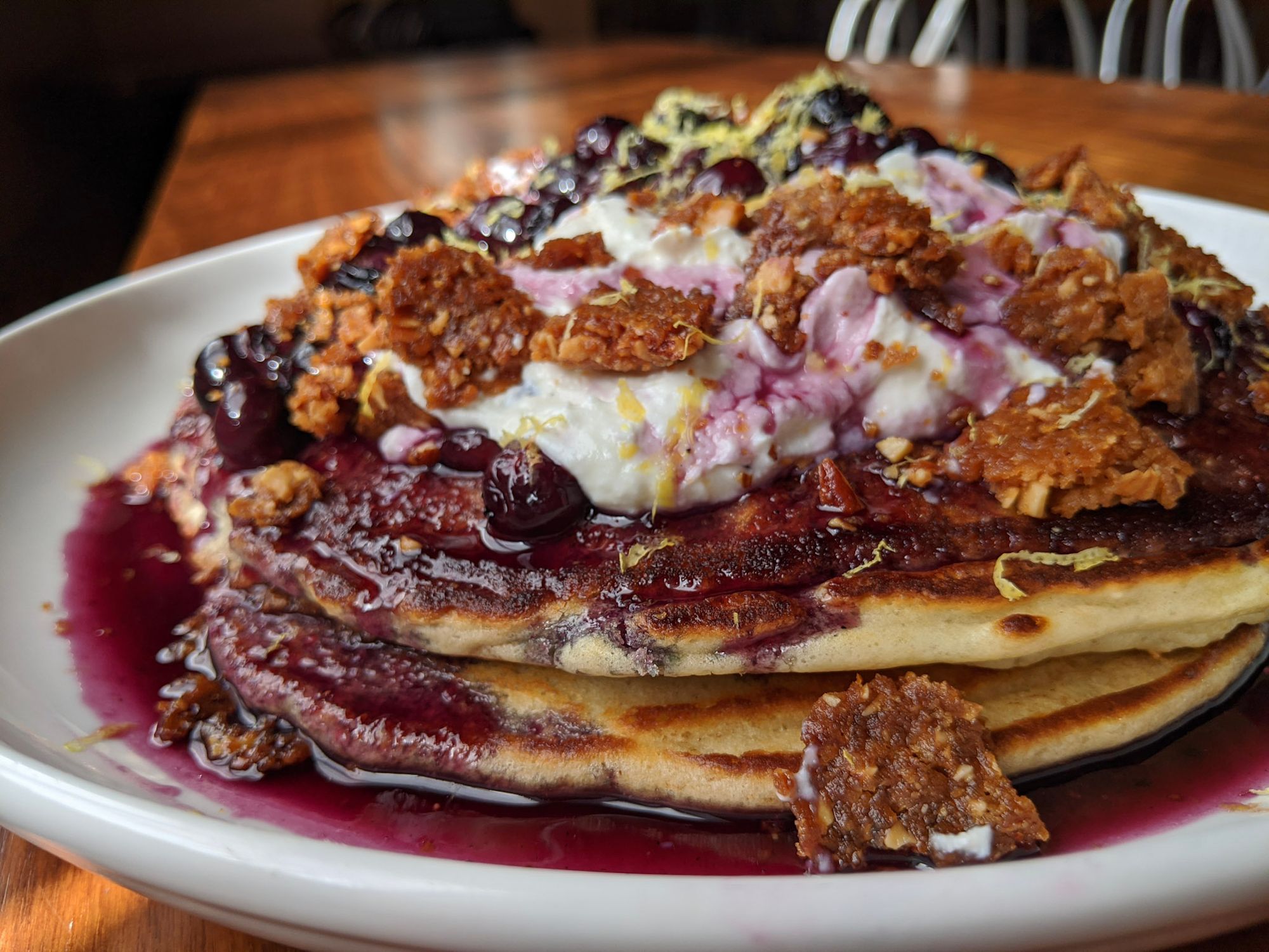 Blueberry pancakes with lemon-ricotta cream and crunchy almond cookie crumbles