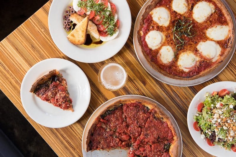 deep dish pizza and two salads at little star and a beer