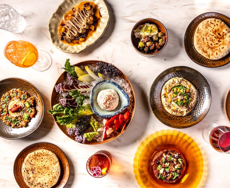 A bird’s-eye view of Alora’s small plates and dips, including duck liver mousse (top left) and muhammara (bottom right). Photo: ⓒ Neetu Laddha.