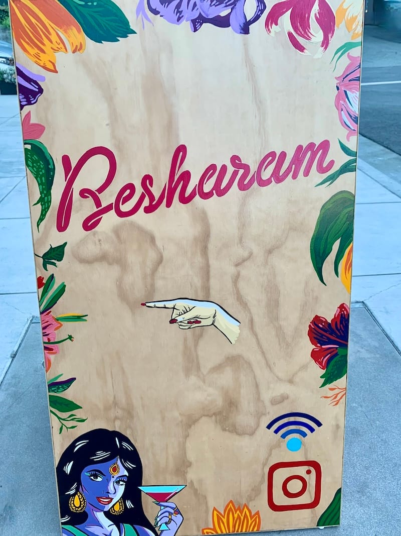 outdoor sign for Besharam