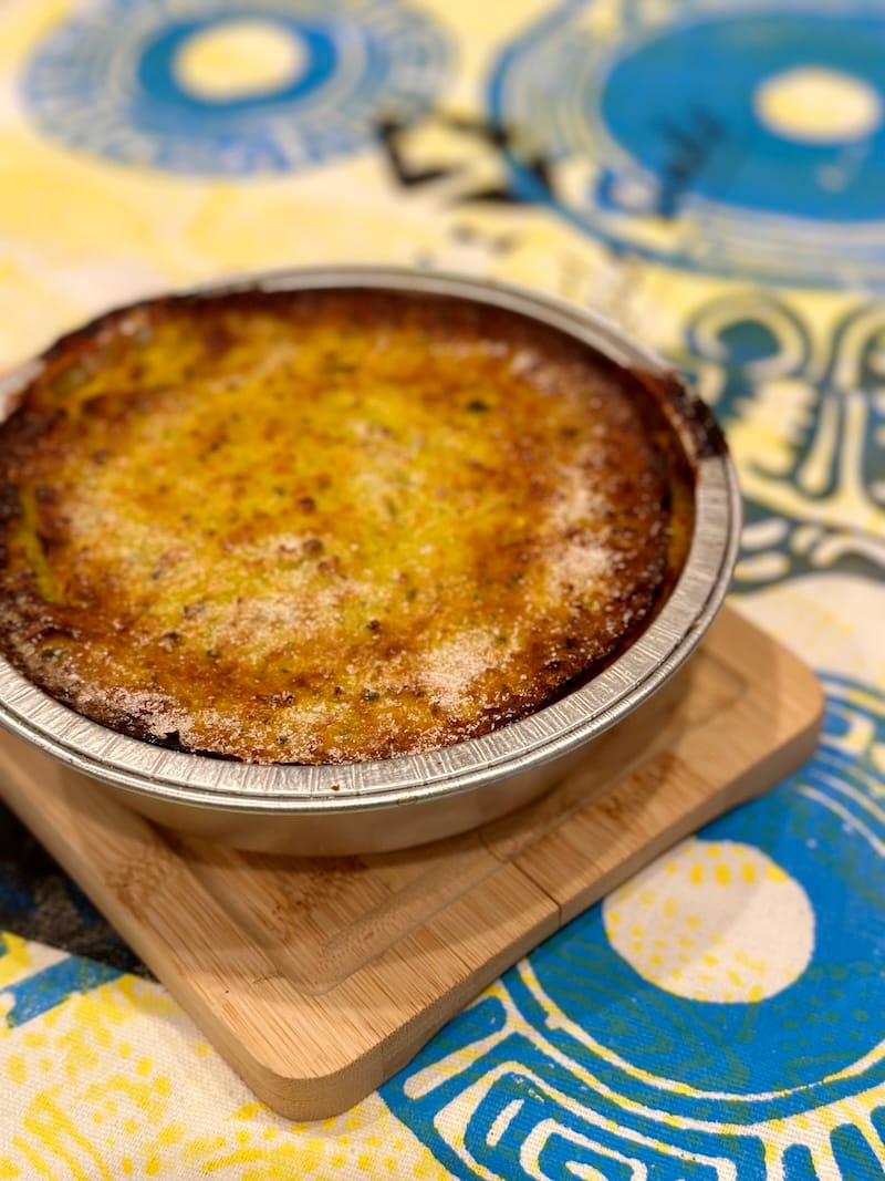 The pastel de choclo casserole with a top layer of grated corn. Photo: © tablehopper.com.