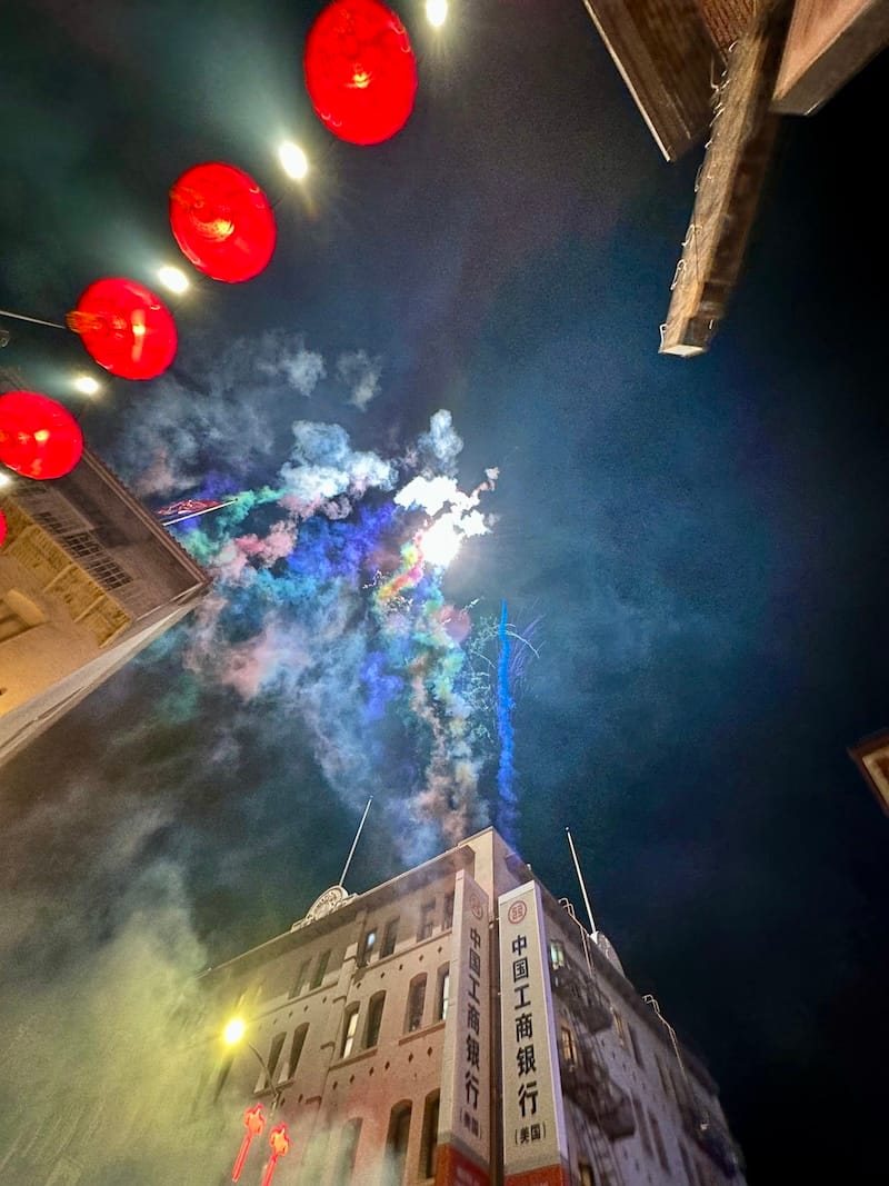 Friday night in Chinatown, with a fireworks warmup for Lunar New Year. Photo: © tablehopper.com.