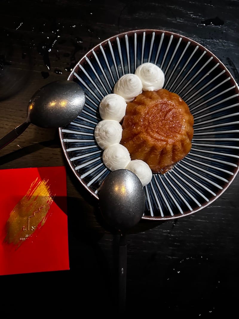 This rum-soaked baba cake with salted cream is simple and complex with sweet and sour notes. Photo: ⓒ Kevin Allen.