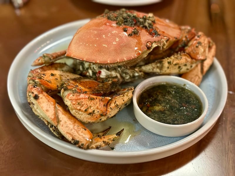 Roasted local Dungeness crab. Photo: © tablehopper.com.