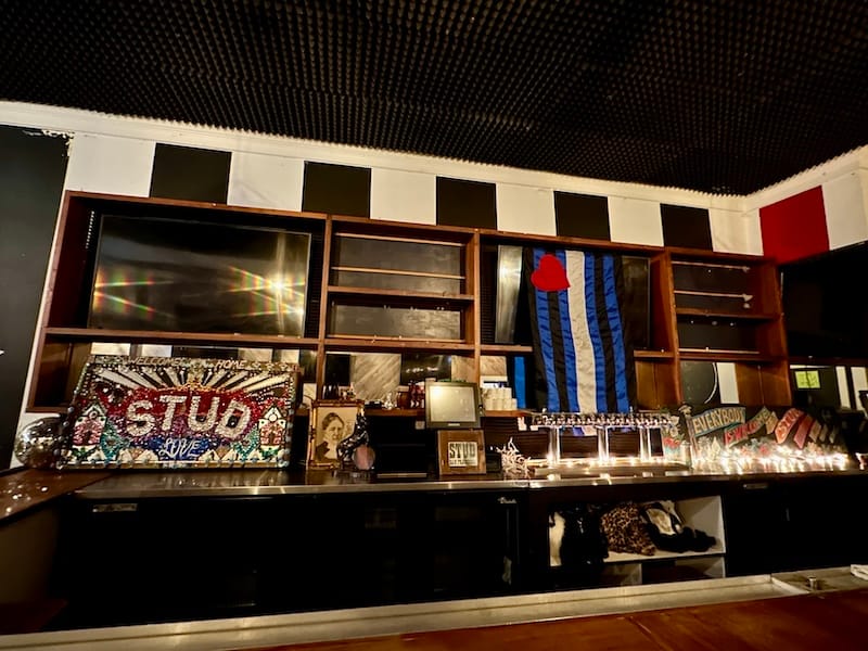 The current bar in the new space (with a few of the historic Stud signs). Photo: © tablehopper.com.