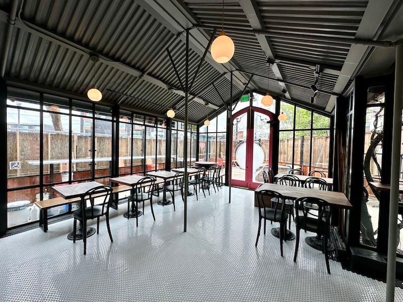 The indoor dining area (before the plywood came down). Photo: © tablehopper.com.