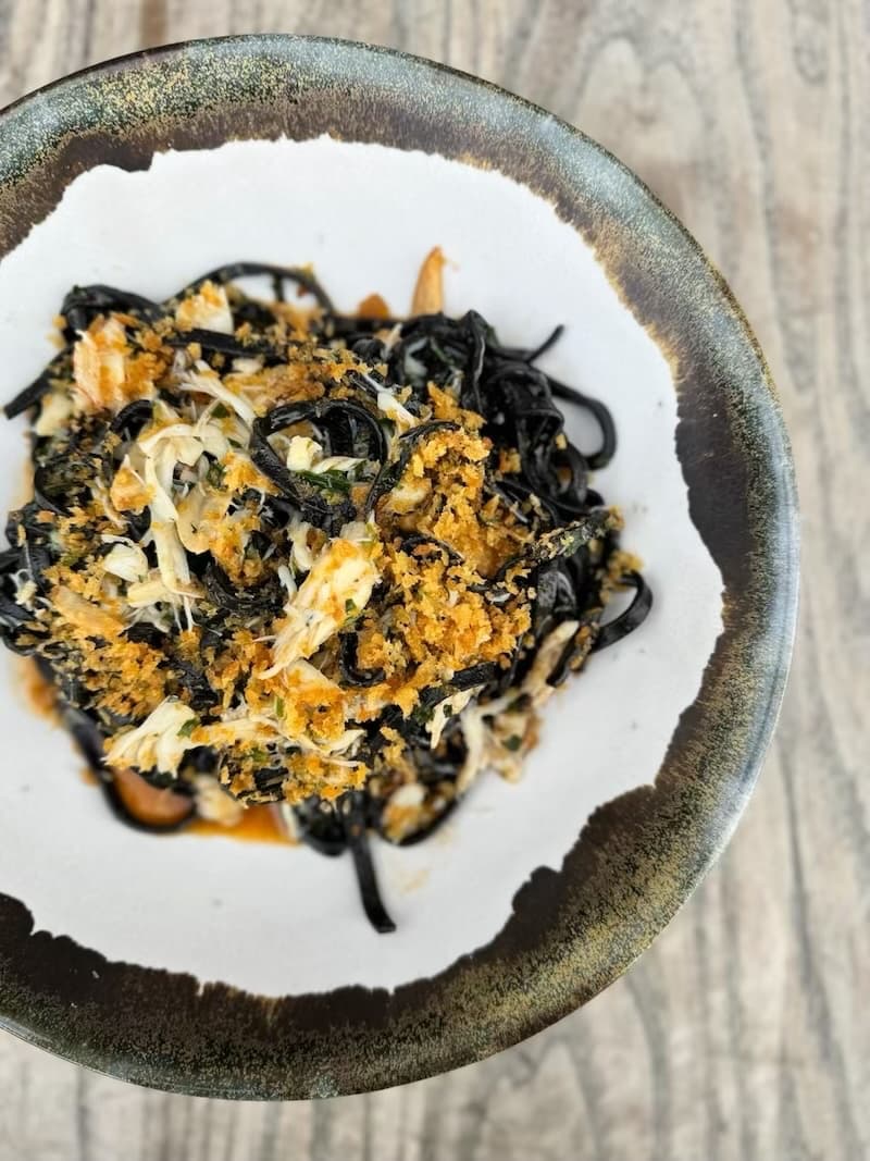 Freshly caught Dungeness crab with squid ink tonnarelli at A16. Photo: Beatrice Fontana.