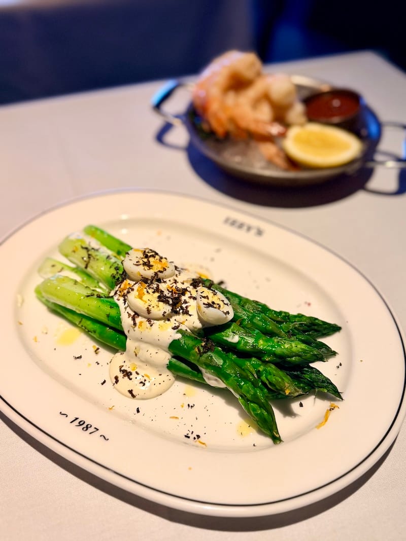 Chilled asparagus with quail eggs and black truffle at Izzy’s. Photo: © tablehopper.com.